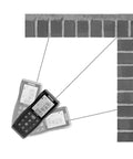 Micro Laser Distance Meter With Bluetooth Sync And Tilt Sensor measuring angles on a brick wall, showcasing precise readings.