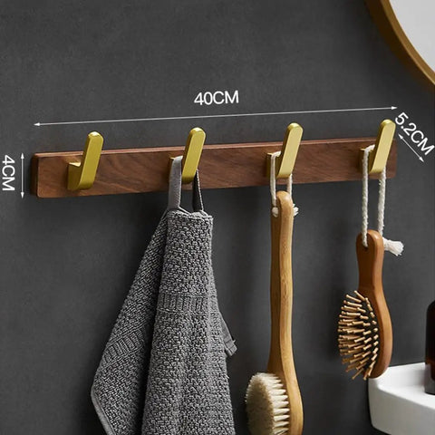 Straight Up Sturdy Five Hook Wall Coat Rack Designed For Hanging Daily Duds Hats Keys And Towels Helps You Keep Your Entryway And Bathroom Tidy With Easy Mounting Hardware Included, showing gray towel and wooden brushes.