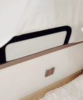 Black metal slide stopper brackets installed under a mattress to prevent shifting, part of Ditch The Daily Slide, Keep Your Mattress Locked Down With These Heavy Duty Retainer Bars, Black Metal Slide Stopper Brackets For Platform And RV Beds, Easy Install Anti Slip Rails That Hold Fast.