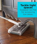 No Fuss Grab And Go Cordless Floor Sweeper Loaded With A Beefy 50 Minute Lithium Charge lies flat under furniture for tight spaces.