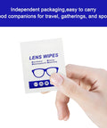 Hand holding individually packaged Alcohol Free Lens Wipes For Glasses And Screens Streak Free 220 Count.