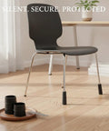 Straight Up Legit Round Chair Leg Protectors With Black PU Leather Slip On Floor Guards For Hardwood Surfaces Quiet Glide Pads on chair legs.