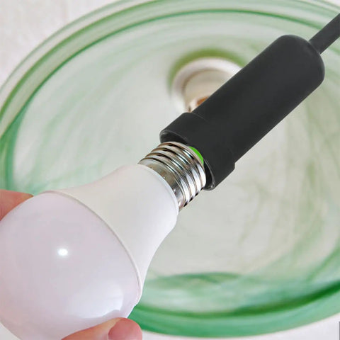 Straight Up Reliable G9 Socket Ring Wrench Kit With Sturdy Plastic T Shaped Handle For No Sweat Lamp Shade Adjustments And Quick Ceiling Fixture Repairs in use with a white light bulb and black socket.