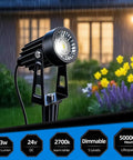 Close-up of a single spotlight from No Fuss All In One Low Voltage Landscape Lighting Kit With Dusk To Dawn Transformer Waterproof Spotlights.