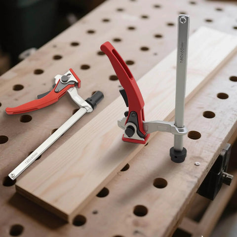 Two Piece Holdfast Dog Hole Clamps Set With Adjustable Range And Multi Angle Ratcheting Table Clamp For Woodworking Tools 20mm Non Slip Chrome Plated Base For Secure Fastening Rock Solid on a workbench