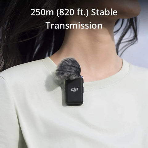 Close-up of Wireless Lavalier Microphone System With Two Transmitters And One Receiver In Charging Case 250 Meter Range clipped on shirt