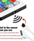 Close-up of RGB LED Light Strip Remote Controller Dimmer With Wireless IR 44 Keys showing sensor and 4-pin connection port.