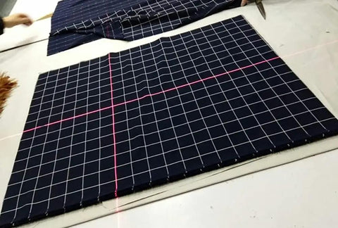 650nm Red Cross Line Module for Indoor Positioning and Crosshair Alignment on fabric with grid pattern