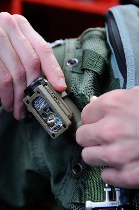 Mounting Sidewinder Compact 55 Lumen Hands Free Military Tac Ready Flashlight With Helmet And MOLLE Mount onto gear