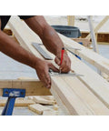 Professional Aluminum Rafter Square 7 Inch With CNC Edges For Dead On Angles in use on wooden beam by carpenter