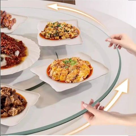 20 Inch Lazy Susan Turntable With Tempered Glass Transparent Rotating Serving Tray displaying dishes on dining table