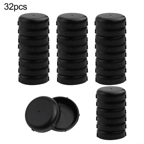 32 Pack Wrought Iron Patio Furniture Base Glides 1.5 Inch Chair Leg Floor Protectors in black with drainage holes.