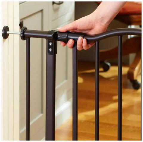 Person installing Portico Arch Baby Gate for Doorways and Hallways, Heavy Duty Metal Safety Gate with One Hand Operation, Pressure Mount