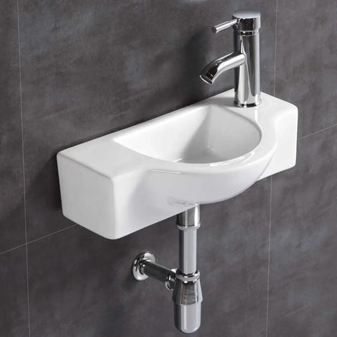 Compact White Ceramic Washbasin And Faucet Combo For Small Bathrooms, Wall Mount Sink Set With Chrome Pop Up Drain installed on wall