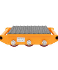 Rock Solid Heavy Duty Machinery Skates With Smooth Rolling Polyurethane Casters For Moving Big Industrial Gear No Sweat Built Tough Alloy Steel Base Supports Up To 15 Ton Loads Easily, shown from side with textured rubber surface.