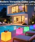 Outdoor scene with Lit RGB Color Changing LED Cube Seat 14-Inch LED Cube Chair With Remote around a pool at a modern house.