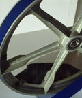 Close-up of Blue Ultra Duty Band Saw Tires For 33 WM14 Band Saw Beefed Up Urethane Replacement Part showing tire and metal frame.