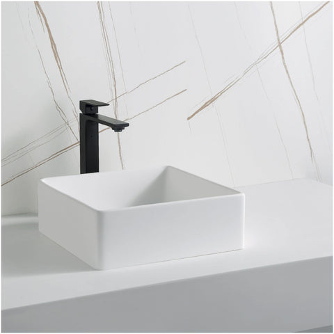 Quattro QM174 Vibrant Matte White 15 Inch Square Bathroom Vessel Sink For Above-Counter Installation on a countertop with faucet