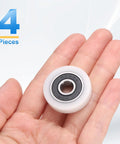 Set Of 4 White Roller Idler Bearing Pulleys 8X30X7Mm With Smooth 608RS Bearings For Quiet Conveyor Track Rolling Wheel Applications In Furniture Hardware Accessories And DIY Projects in hand.