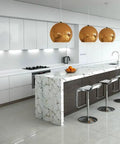 Modern kitchen featuring Water Based Stone Enhancer And Sealant For Marble Granite Limestone countertop with sleek bar stools.