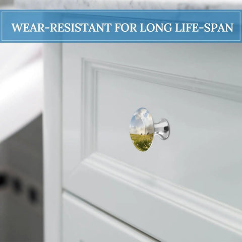 Close-up of Meadow Style 1.1 Inch Cabinet Knobs And Drawer Handles Set in stainless steel alloy on white dresser drawer.