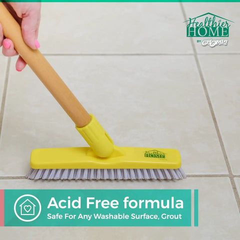 Hand using yellow brush on tile floor with Grout Cleaner Bundle With Grout Brush Pro Grade Deep Clean And Stain Removal label.