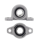 Super Heavy Duty Zinc Alloy Flange Mounted Ball Bearing Unit Built Like a Tank For Industrial Rig Applications Featuring Pre Installed Deep Groove Insert For Knock Around Resistance and Smooth Sailing at 15 Mm from top and bottom views.
