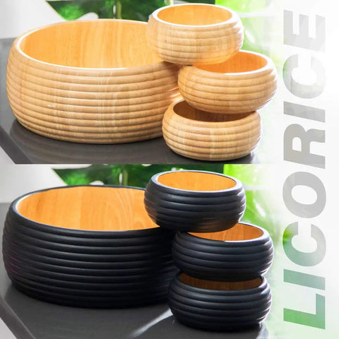Stack of nested wooden bowls in natural and black finishes on a table, highlighting Luxurious Chalk Finish Furniture Paint For DIY Home Decor And Wood Cabinets All In One Chalk Craft Paint With Rustic Matte Look In Black Liquorice Eight And A Half Ounces Covers About 32 Square Feet.