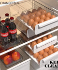 Eggs Fridge Organizer Drawer Bin Set For Maximum Freshness Pro Grade Large Plastic Egg Holder with eggs in a refrigerator.