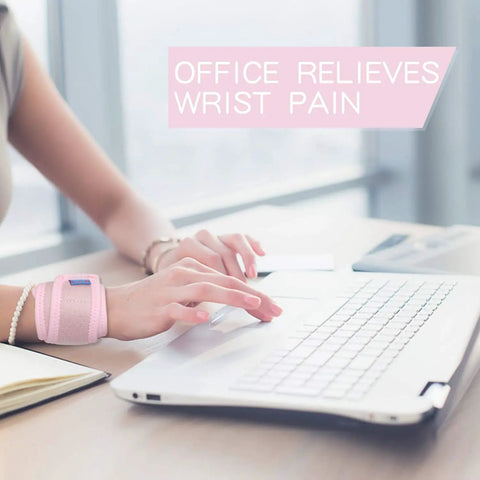 Person wearing pink 2 Pack Adjustable Wrist Brace For Sports Pain Relief And Injury Recovery using laptop in office