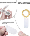 12 Pack Fairy Lights Battery Operated String Lights with open battery case, CR2032 batteries, insulation sheet instructions