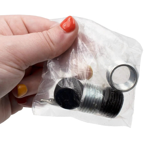 Hand holding small parts for Low Capacity Millivolt Gas Valve 1/2 Inch By 1/2 Inch, Compact Replacement Valve For Gas Furnaces, Ranges, And Fireplaces