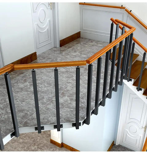 Quick Install Black Stair Balusters Side Mount Deck Railing Posts With Go Anywhere Screw Kit For Lofts Flexes To Match Layout Built Damn Tough Smudge Free Matte Finish on a staircase with wood railing.