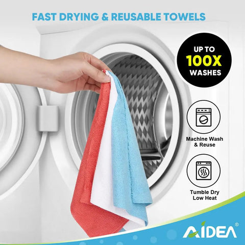 Hand holding blue microfiber shop towels roll with 55 sheets washable and reusable 11x9 inch cloths near washing machine