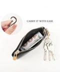Full Grain Leather Coin Purse And Keychain Wallet With Slick Pull Zipper Closure Handy Card Slots Stylish Matte Black Finish showing keys and cash inside.