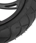 Close-up of 12 Inch Electric Scooter Tire With Wheel Hub Rubber Tyre Replacement 12 1/2 X 2 1/4 highlighting tread pattern.