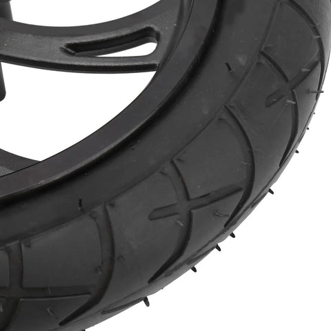 Close-up of 12 Inch Electric Scooter Tire With Wheel Hub Rubber Tyre Replacement 12 1/2 X 2 1/4 highlighting tread pattern.