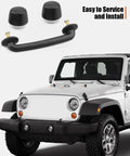 Close-up view of front windshield hold-down bracket and rubber hood bumper with bolts for Jeep Wrangler JK/TJ