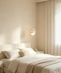 HLRCB Indoor Pendant Light, Cream White, Globe Shade Suspended Mount hanging above a light-colored bed in a serene bedroom.