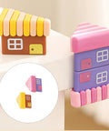 Colorful house-shaped table corner guards for safety. Decorative bumpers on table corner preventing injury