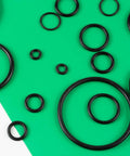 O Ring Assortment Kit With 225 Pieces In 18 Sizes Premium Rubber O Rings For Automotive Plumbing Faucet Air And Gas Connections Seal Gaskets DIY Repair Projects Leak Proof And High Temperature Resistance on green background