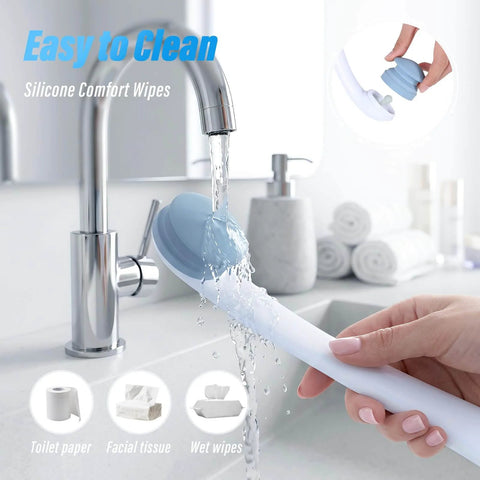 Butt Wiper Tool With Replaceable Head And 16.5 Inch Handle Locking Mushroom Head Toilet Aid being rinsed under faucet