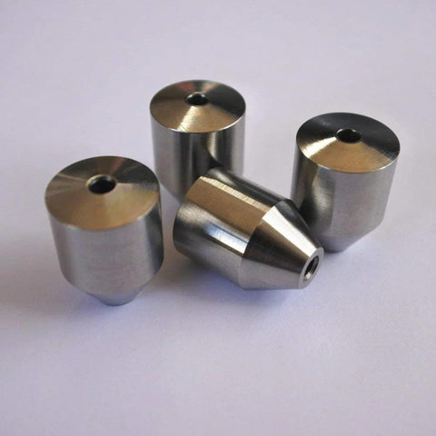 Set of four 3/8-inch bullet-coned steel inserts for waterjet cutting machines.