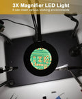 DIY Friendly Pro Grade Heavy Duty Soldering Stand With 360 Degree Rotating Clamp 3X LED magnifier showing a circuit board