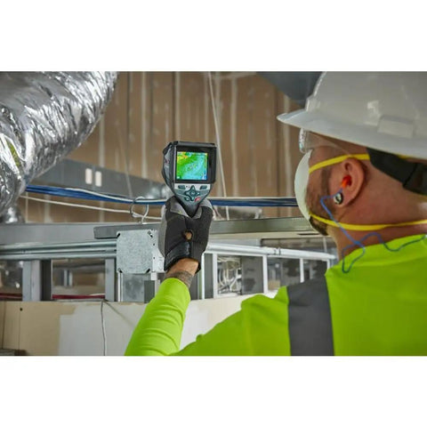 Worker using 12V Max Connected Thermal Camera With 500 Sharp Thermal Images Storage For On Site Inspections, Pro Grade Intuitive One Tap Interface For Fast Results.
