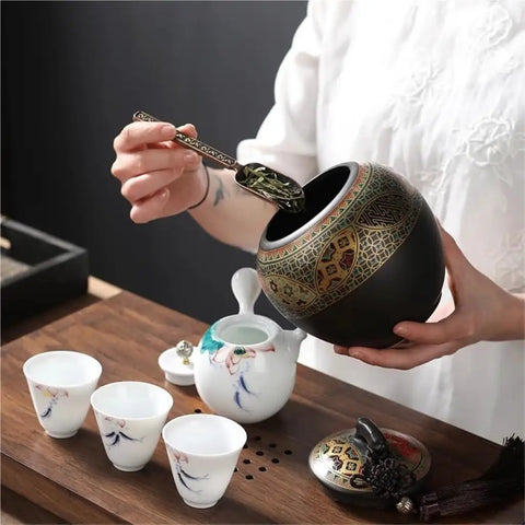 Slick Ceramic Airtight Storage Jar For Coffee Beans Sugar And Snacks Sleek Large Kitchen Container With Tight Seal Keeps Everything Crisp Down Home Vibes Total Game Changer with loose tea being measured.