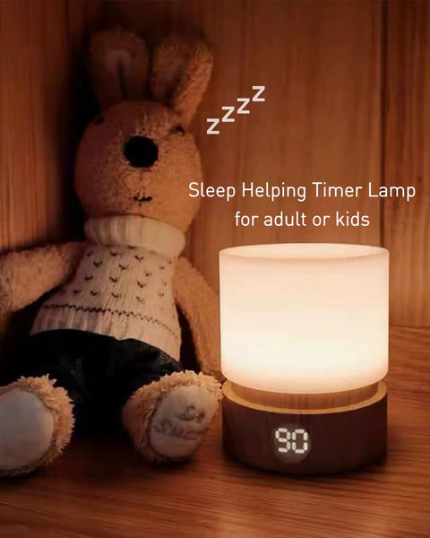 Dimmable LED Night Light With Timer For Nursery And Kids Bedroom, Woodgrain Bedside Lamp beside stuffed animal