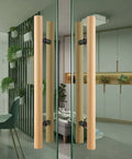 Beefy Wood Door Pull Set For Sliding Barn Doors And Shower Doors Natural Finish Indoor Outdoor Handles 40 Inch Long Pair With Hardware Included Easy Assembly installed indoors.