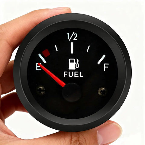 Person holding 2-Inch Universal Car Fuel Gauge Kit For 12V Vehicles With 240-33 Ohm Sender, E-One-Half-F Pointer, 52mm Tank Level Indicator