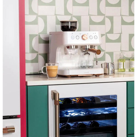 Next Level Semi Automatic Espresso Machine With Badass Built In Grinder And Silky Milk Frother Featuring WiFi App Control Custom Drinks 15 Bar Pump 95 Oz Water Tank Matte White Copper Accents on kitchen counter.